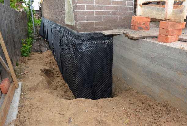Happy homeowners after waterproofing job in Vauxhall